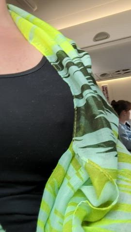 Sneaky titty (f)lash on the plane