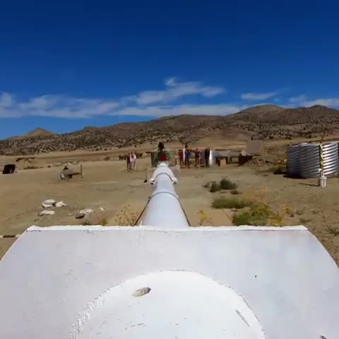 ripsave - A giant 120 mm cannon hitting a barrel of water