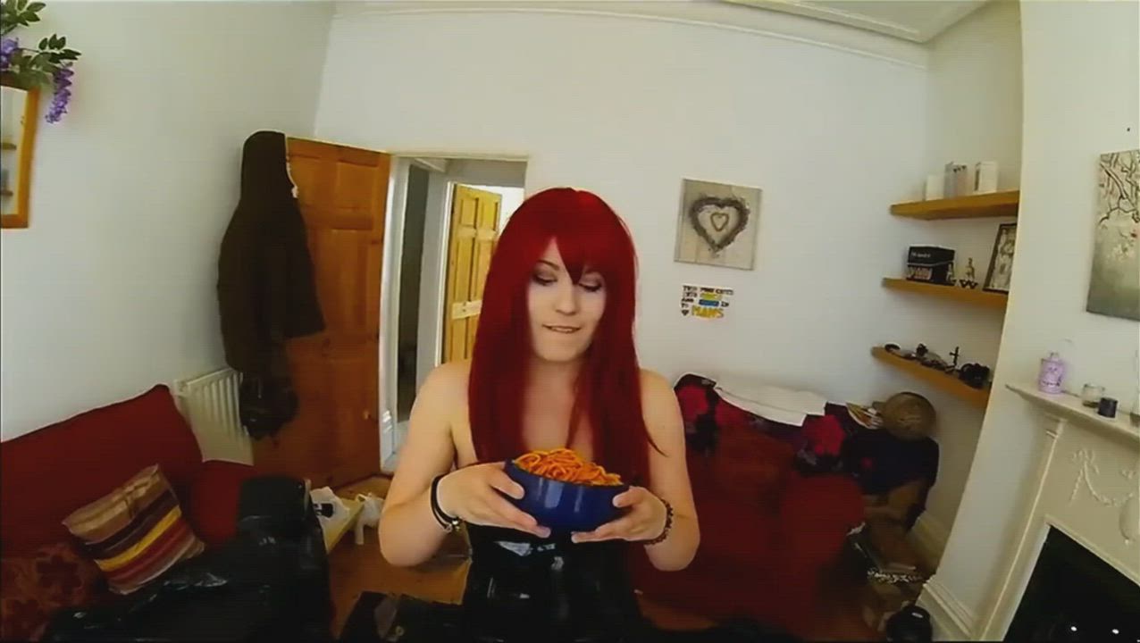 Gorgeous redhead ruins her hair and a pretty leather dress with food