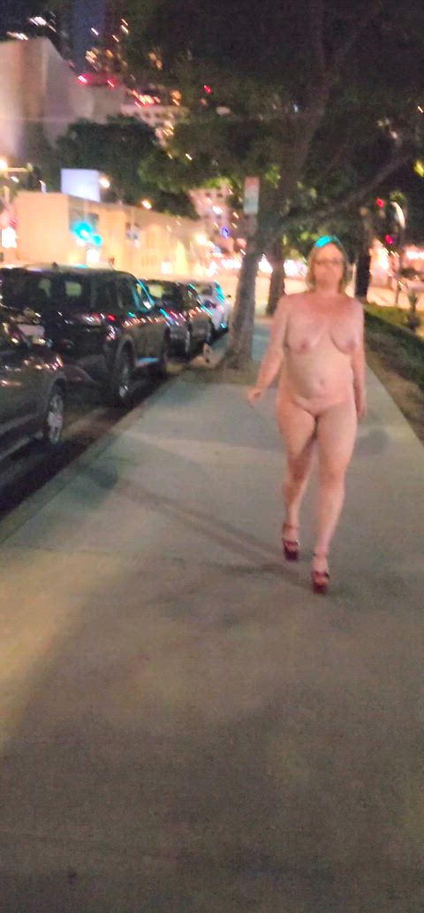 Taking a naked stroll in Downtown Los Angeles. (F)