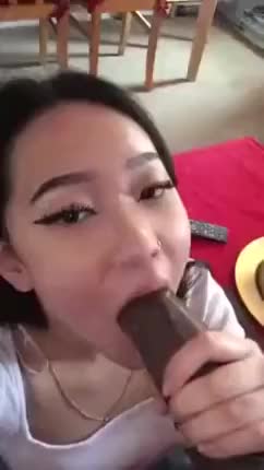 Asian Teen Sucks On Big Black Cock
