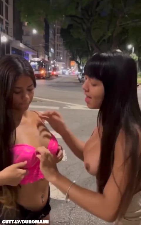 amateur exhibitionist flashing lesbian lesbians public sucking tits topless trashy