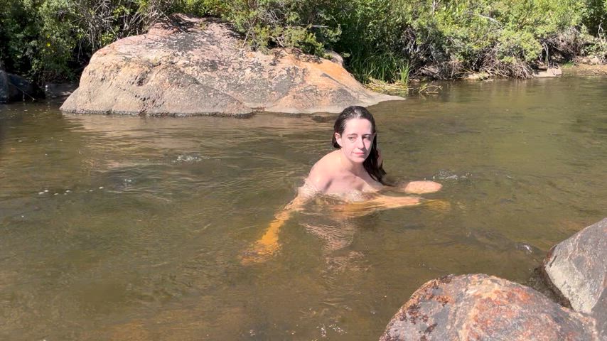 Skinny dipping in a river