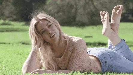 Hilary Duff feet up and in motion