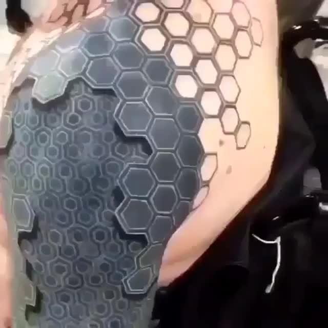 Impressive 3D hexagonal tattoo