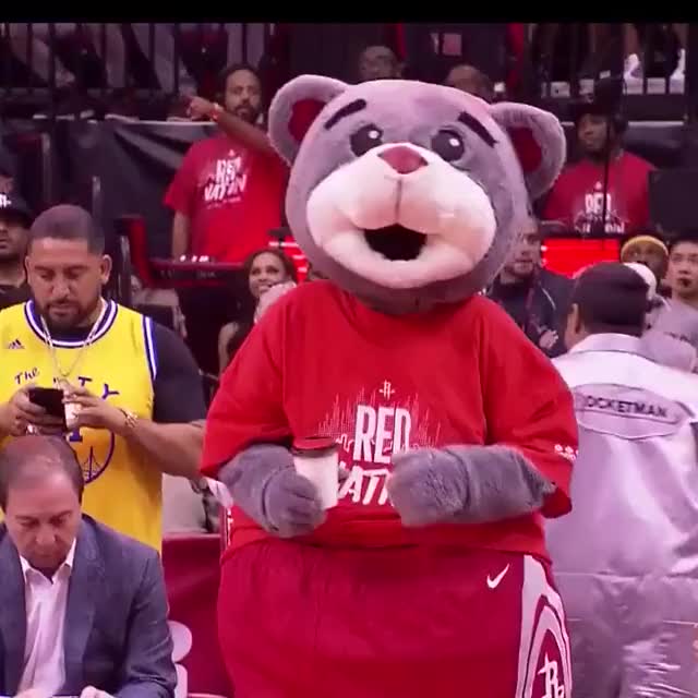 THIS IS NOT A BLOOPER - - The Mother of Dragons is at the Rockets game with a coffee!