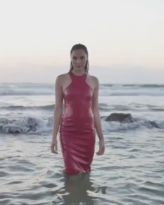 Gal Gadot looks good with a wet dress clinging to her tight body