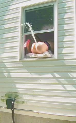 Dilldoing and huge squirting out of window