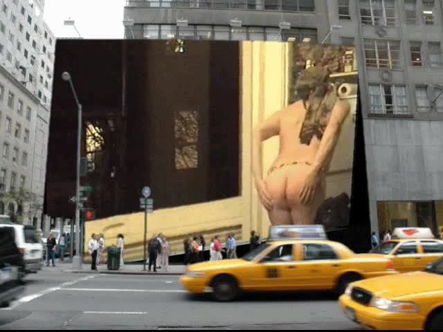 Public bare booty wiggling billboard by Mark Heffron