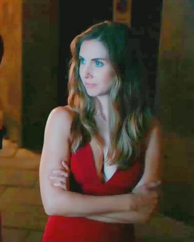 Alison Brie suggestive gesture in Spin Me Round (2022)