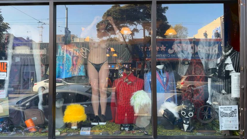 Dancing naked in a shop window!