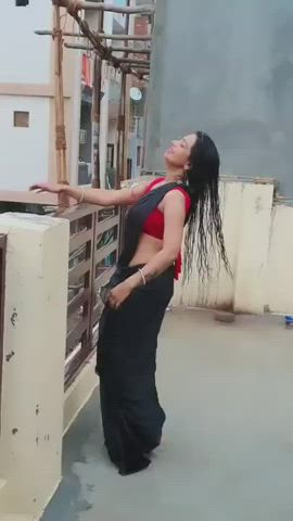 Sexy bhabhi doing rain dance in a saree (No Nudity)