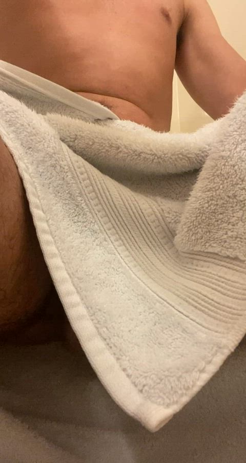 Hanging low under the towel