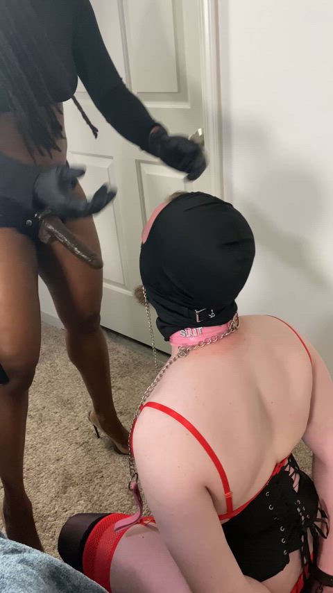 Black domme in ATL making her submissive gag on her black cock.