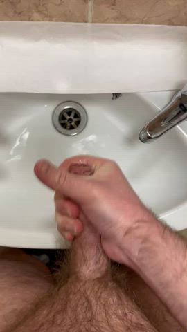 Cumming in the office bathroom sink
