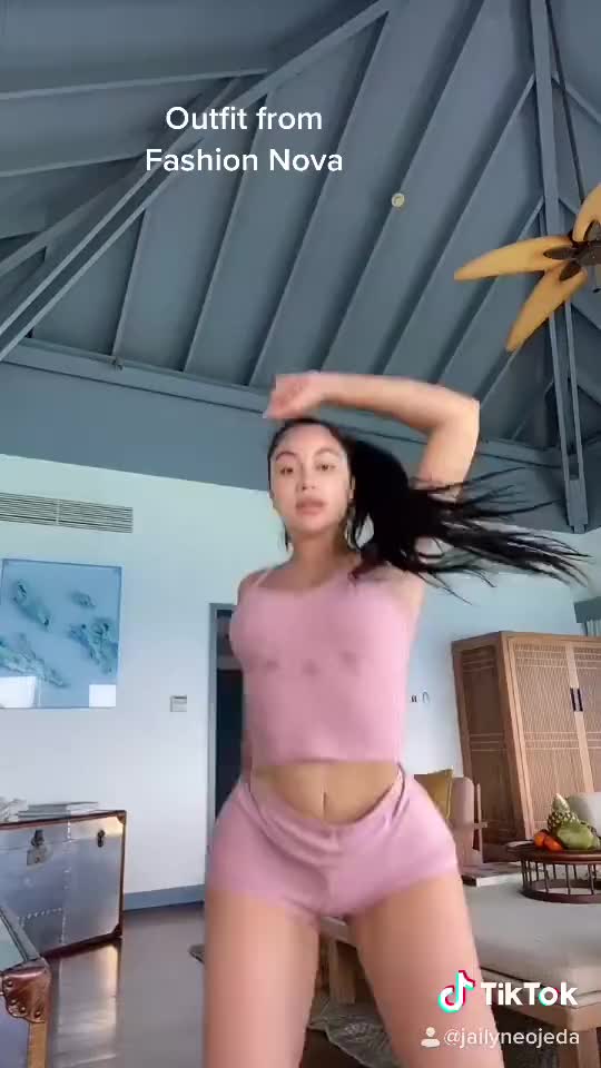 Twerking in pink booty shorts