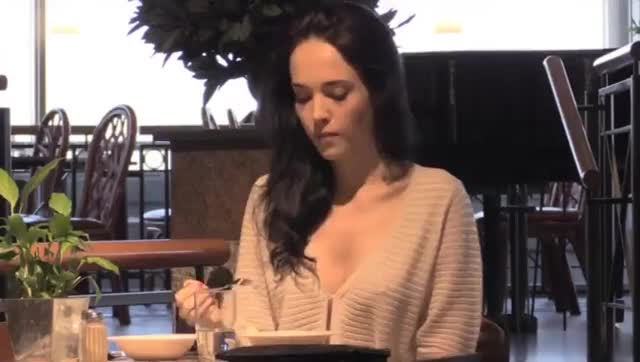 gyfffLADY EATING WITH A TIT POPPING OUT