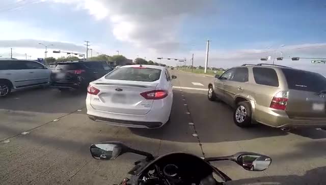 Motorcyclist Is Lucky To Make It Out Alive