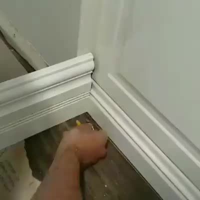 Woodworking on a baseboard to make a perfect fit