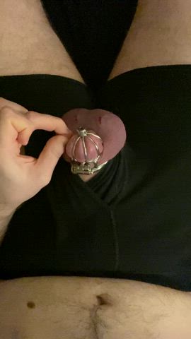 Cumming through my urethral plugged cage (ignore the cuts on my balls, shaving accident)