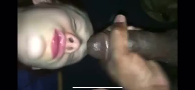dumb white slut let’s black dude empty his nuts full of African seed on her face