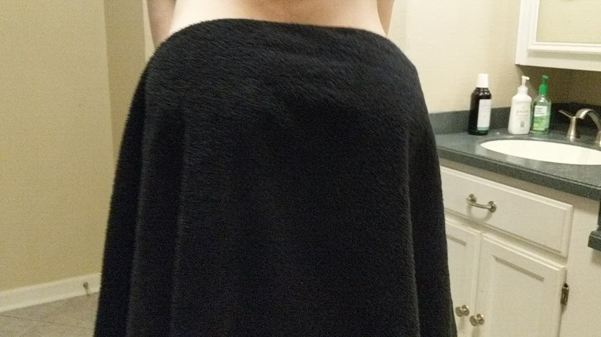 My naturals hold up a towel (until I shake them)