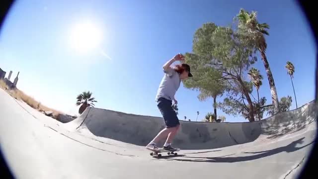 Girl Skateboarding Topless at Desert DIY Skatepark