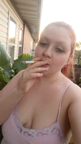 outdoor redhead smoking teasing tits clip