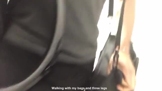 Walking with my bags and three legs