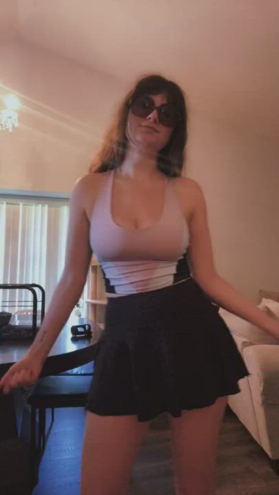 Bouncing Tits in a Skirt