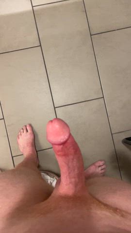 Stripped down and stroking in the work bathroom