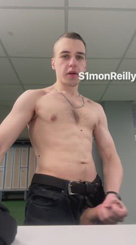 Quick cumshot while other guys are changing clothes in gym locker room