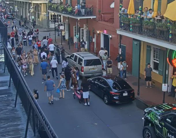 sexy woman flashes multiple times on bourbon street.