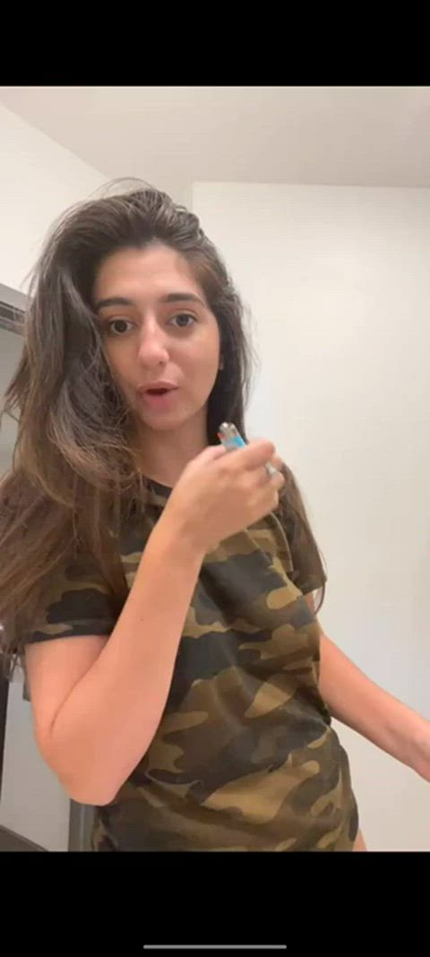 Who's this in her Camo T-shirt showing her Tits?