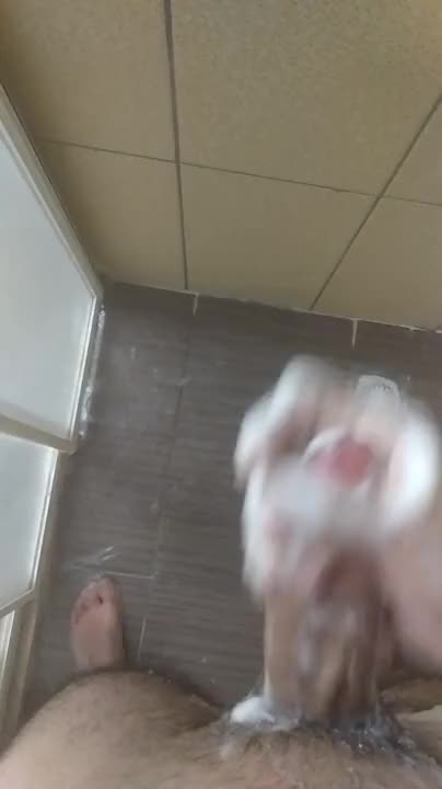 Stroking his thick White cock in the shower
