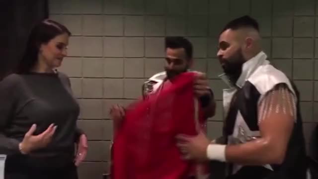 Stephanie McMahon doing a sexy Bollywood dance with two Indian wrestlers. Imagine