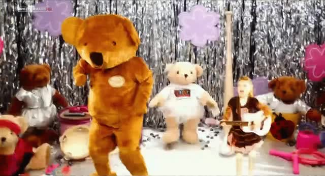 Standing-Ovation-2010-GIF-00-57-41-girl-dancing-with-bear