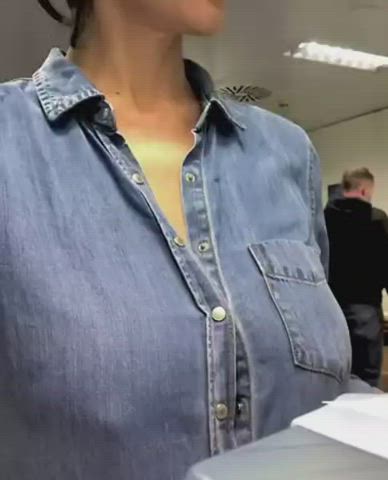 Unbuttoned shirt to covertly flash big tits