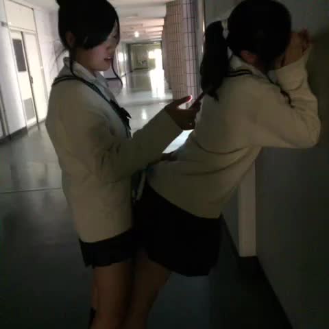 Japanese schoolgirls dry humping in hallway