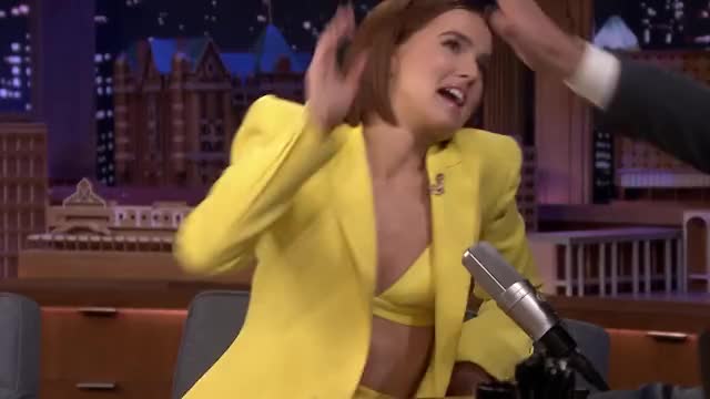 Zoey Deutch - The Tonight Show w Jimmy Fallon (Feb 2020) - showing yellow bra, cleavage