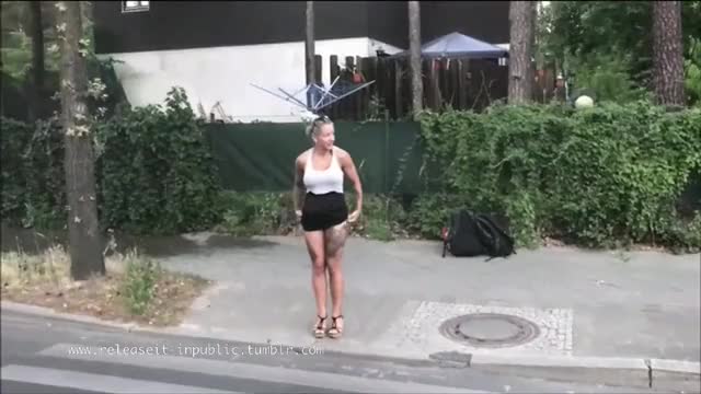 fit blonde pisses in the street