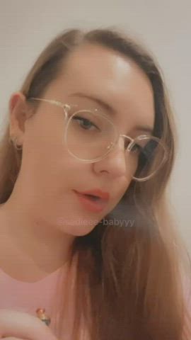 brunette cute girlfriend glasses pink smoking teasing tiktok tongue fetish clip