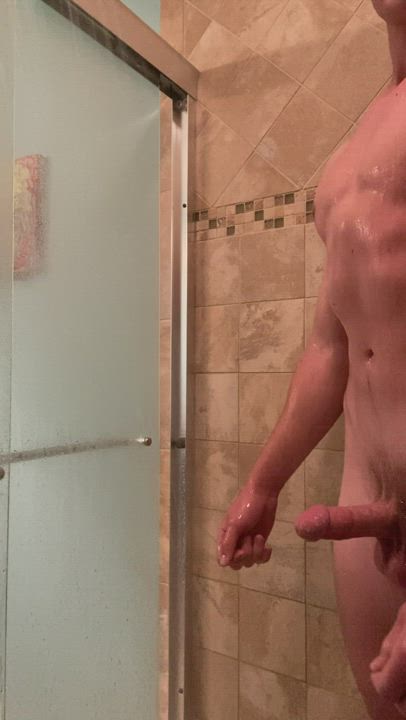 Jerking off and cumming in a nice hot shower... I wish there was someone in here