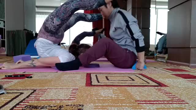 Assisted backbend with Silika