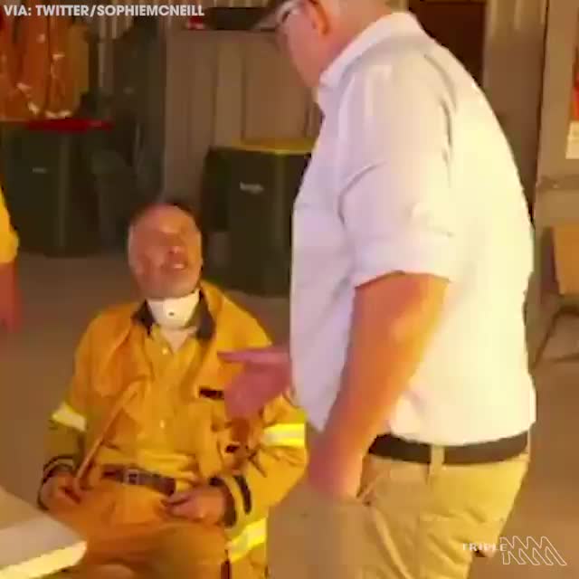 Firefighter refusing to shake Australia's Prime Ministers hand