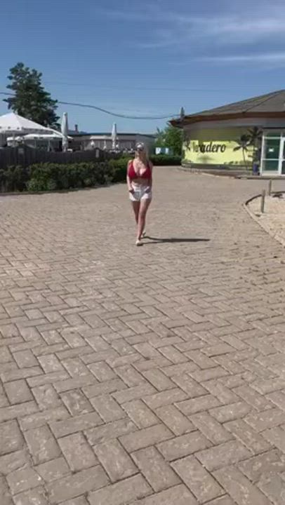 Bouncing tits in red bikini top