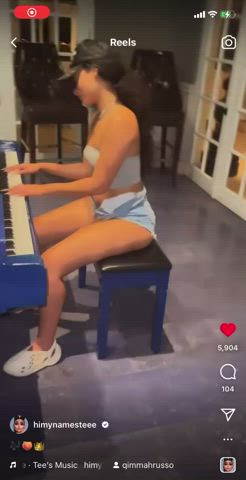 Can someone tell me what song she is playing???