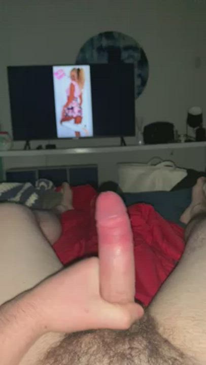 Currently jerking to censored porn and absolutely leaking while my plug rubs against