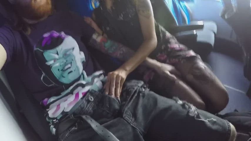Punk chick pulls his cock out at the back of the bus