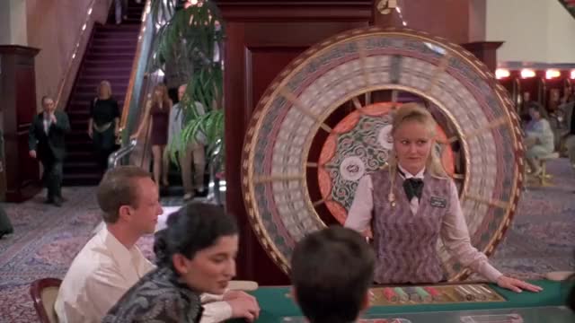 Vanessa Angel - Kingpin (1996) - in tight maroon dress at casino